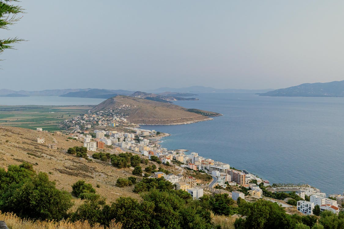 Aerial view of the Albanian Riviera coastline at Saranda with turquoise Ionian waters