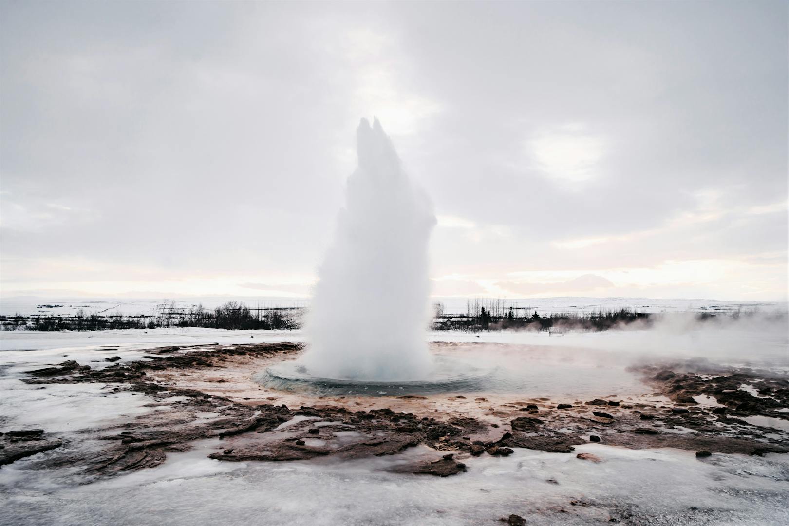 Iceland Adventure Tours: What to Expect When the Weather Doesn't Cooperate ToursZoom Strokkur geyser erupting on Iceland's Golden Circle