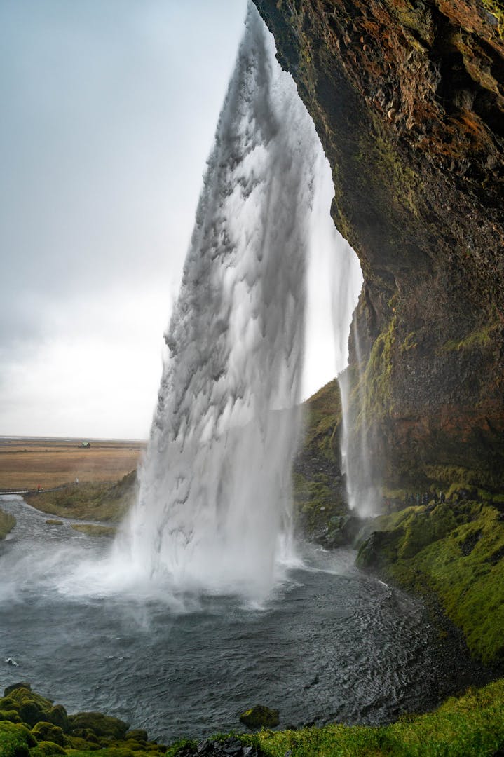 Iceland Adventure Tours: What to Expect When the Weather Doesn't Cooperate ToursZoom Seljalandsfoss waterfall cascading from the cliffs of Iceland's south coast